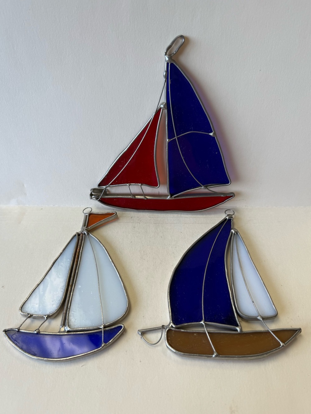 Set Of 3 Stained Glass Sailboat Sun Catchers Blue, Red, White, & Brown.